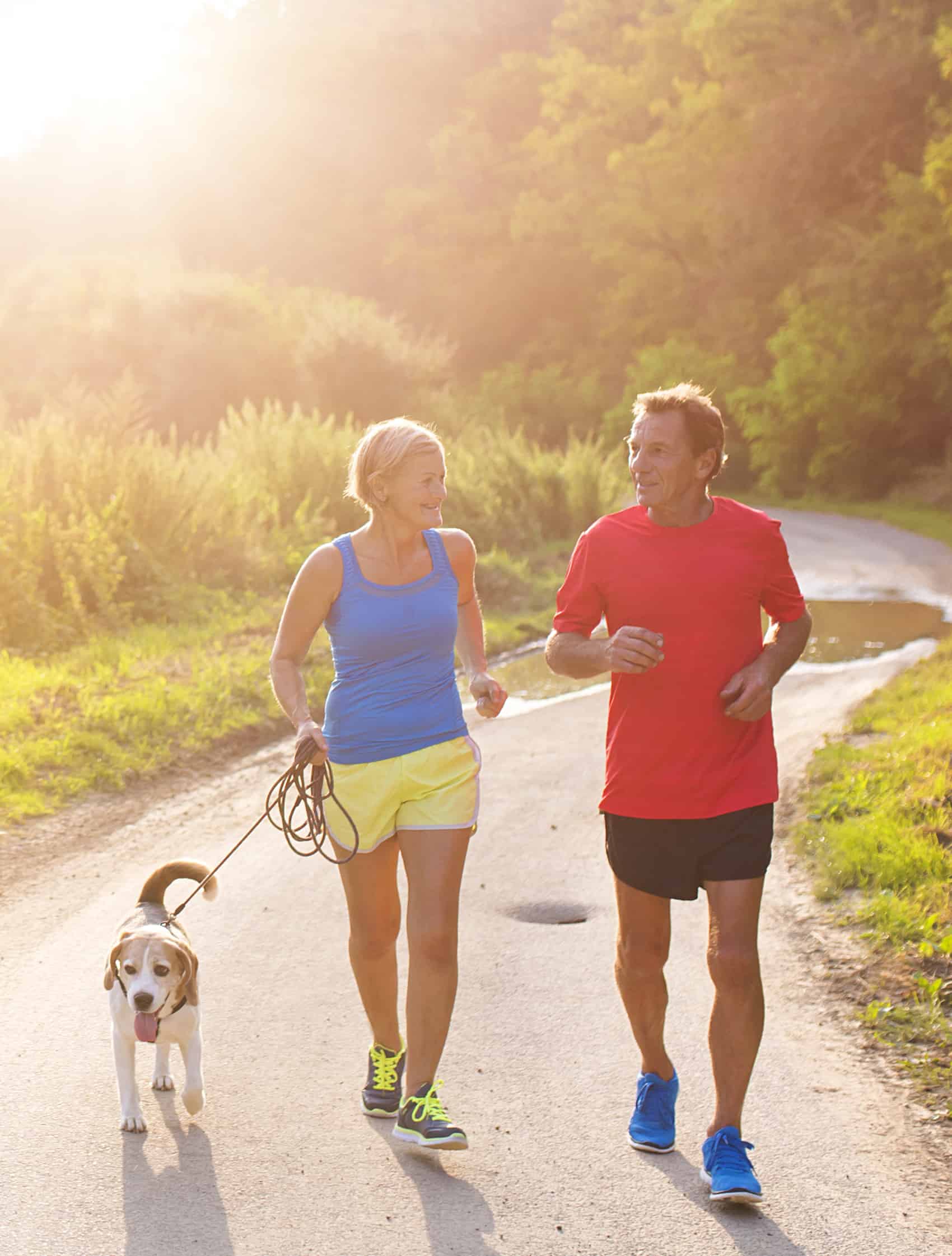 Senior couple running