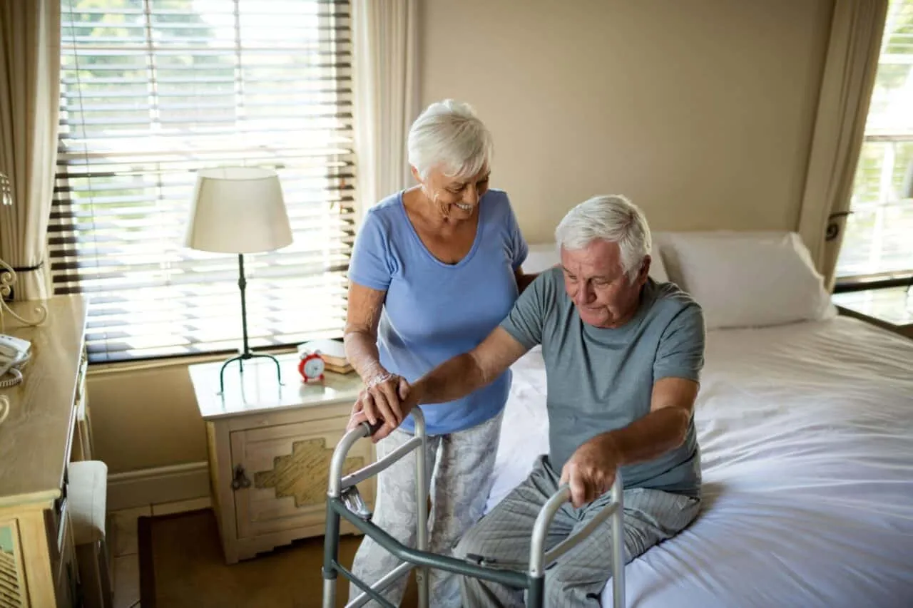 Man Recovering At Home From Total Knee Replacement